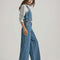 side view of model wearing low rise wide leg denim carpenter pants