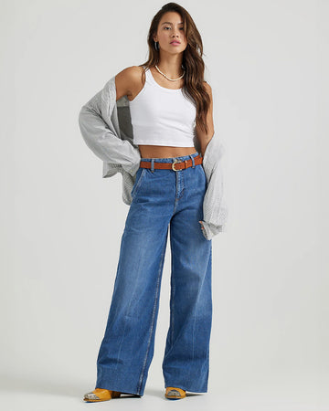 model wearing medium denim a-line trouser