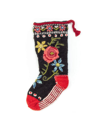 black knit stocking with colorful floral print