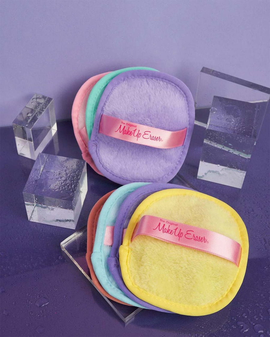 set of 7 pastel colored reusable makeup wipes with laundry bag