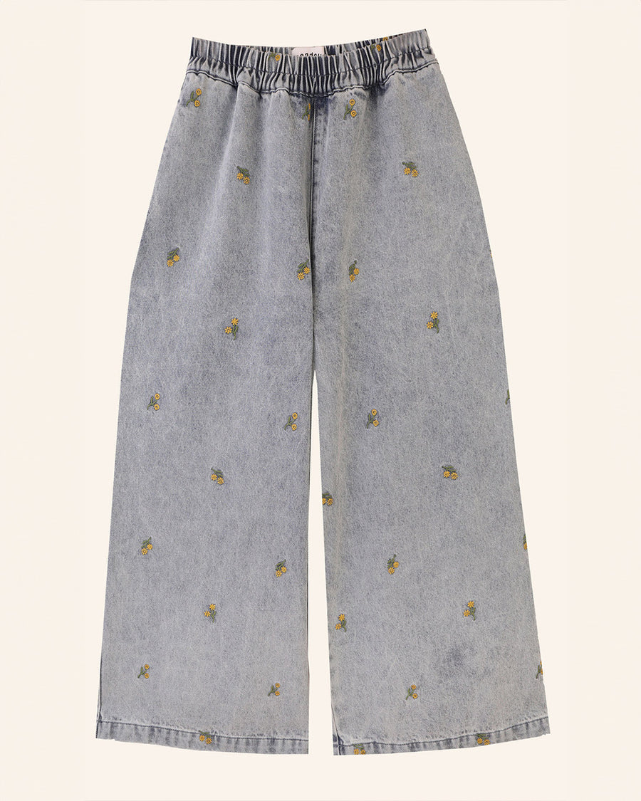 washed wide leg denim with dainty yellow embroidered floral print