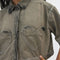 up close of model wearing cropped chocolate acid wash button down top with heart shaped front pockets