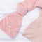 up close of blush pink weighted sleep mask