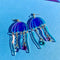 blue jellyfish dangle earrings with beaded tentacles