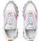 top view of white sneakers with pink and silver accents with grey speckled lug sole