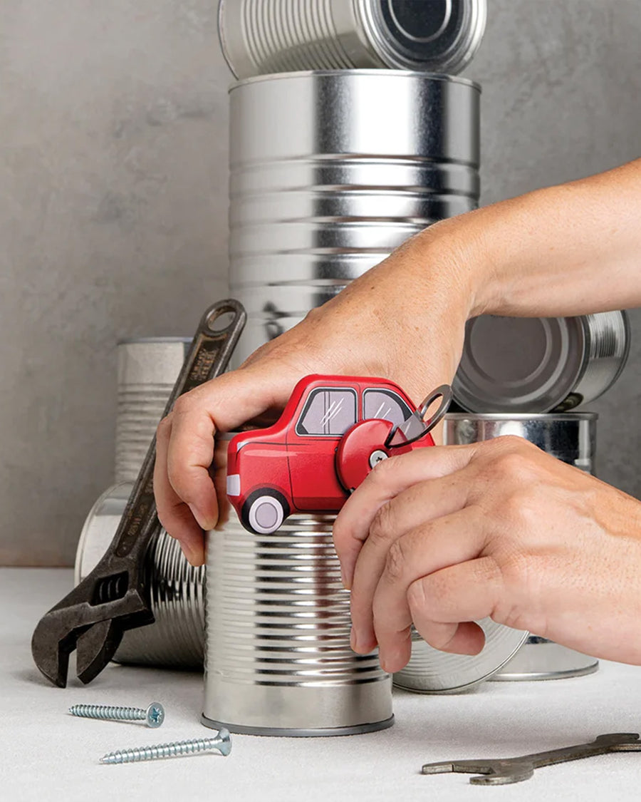 model using red car can opener