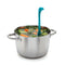 teal nessie ladle with leg shaped stand in a pot