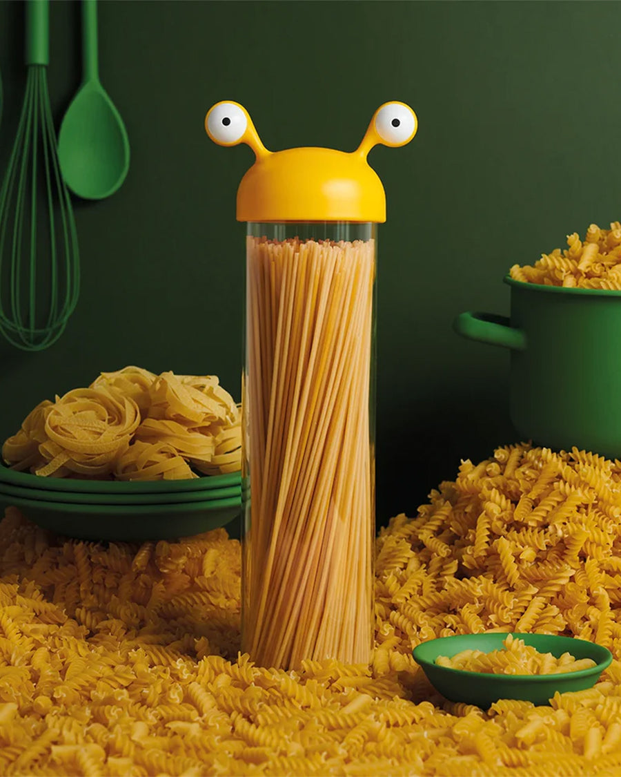 yellow monster spaghetti holder with pasta inside