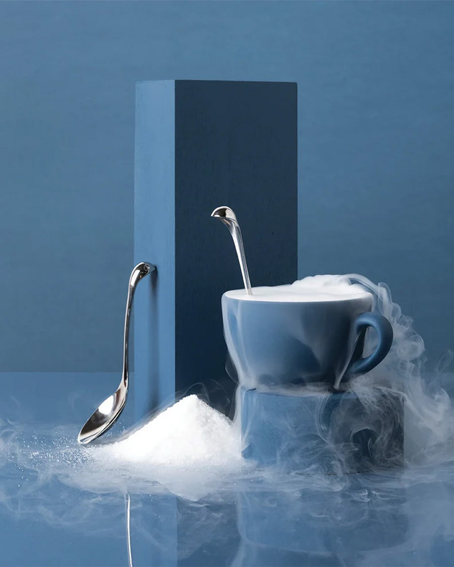 silver nessie shaped sugar spoon in a cup