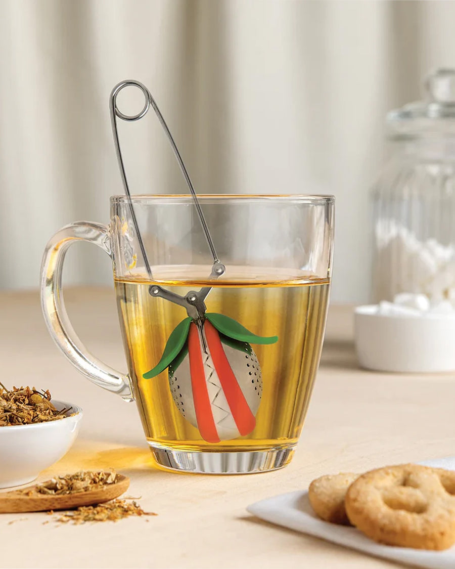 metal venus fly trap tea infuser in a cup