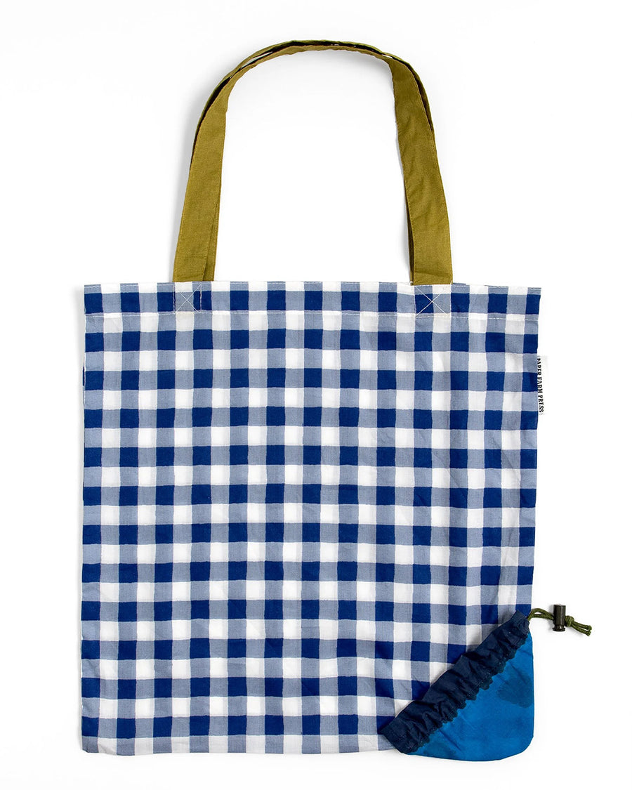 blue gingham market bag with green strap and blueberry bag