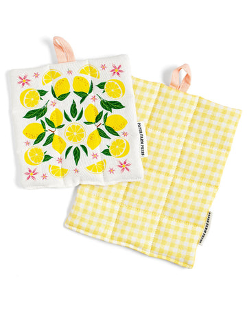 set of 2 pot holders with lemon print on one and yellow gingham on the other with pink hanging loop