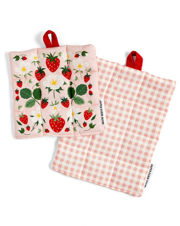 set of 2 pot holders with strawberry print on one and pink gingham on the other with red hanging loop