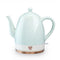 mint ceramic electric tea kettle with rose gold accents