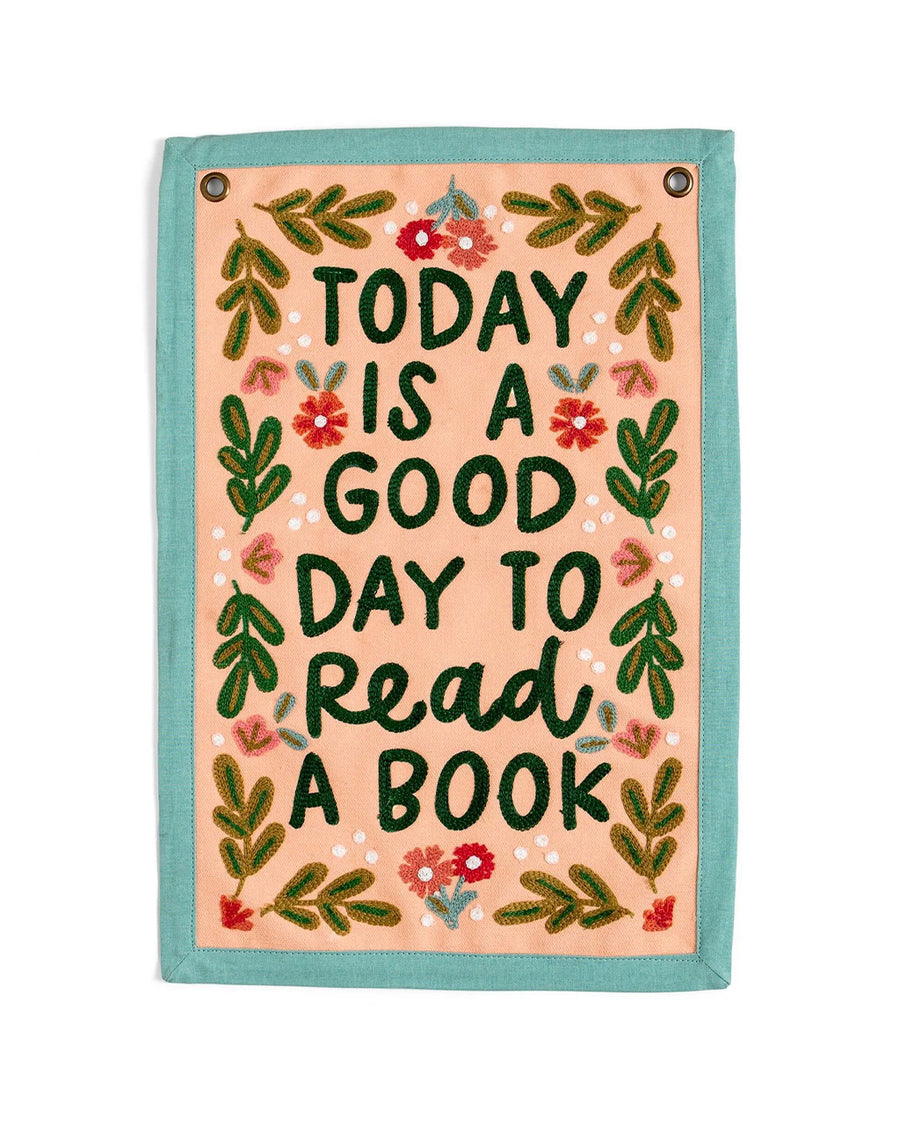 11 in. x 14 in. embroidered wall hanging with colorful flowers and'today is a good day to read a book' across the front