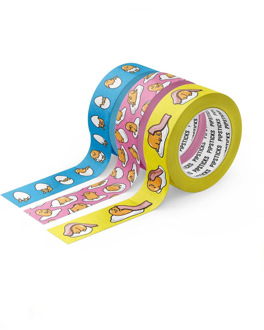 Set of three rolls of Gudetama print washi tape: 15mm x 10m roll of Gudetama Nice To Meat You Washi 15mm x 10m roll of Gudetama Gude Vibes Only Washi 15mm x 10m roll of Gudetama Shell Me About It Washi