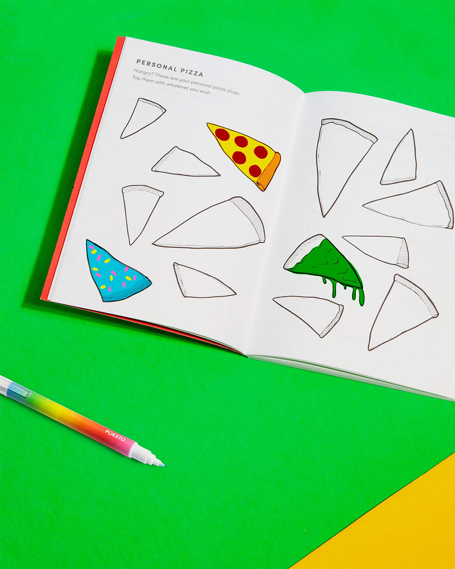 colored pizza page inside of journal with "The Creativity Journal" printed in gold and covered in colorful waves