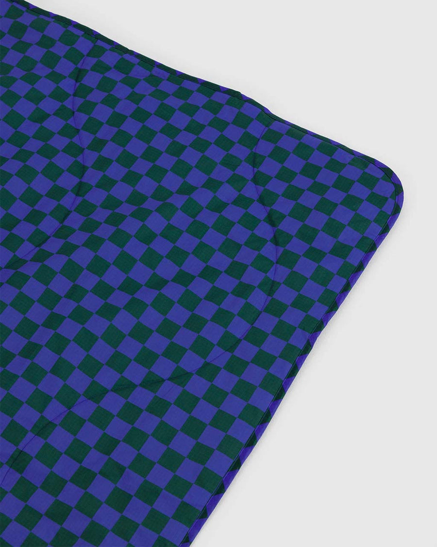 puffy picnic blanket with green and bright blue checker print