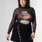 model wearing black sheer long sleeve top with turtleneck and seafood tower graphics