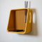 mustard 3d printing modern floating wall shelf with various items on it