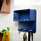 blue 3d print magnetic key ring holder  on a wall with various items inside of it