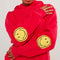 up close of model wearing red hoodie with yellow smiley print on sleeves