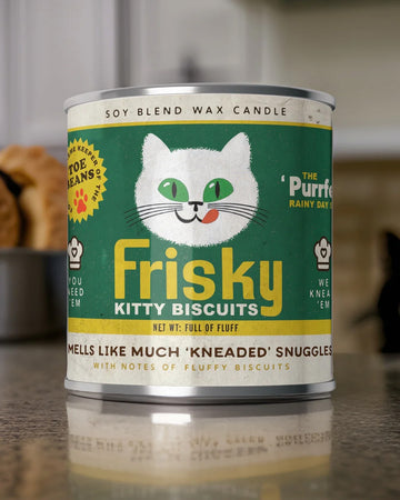 'frisky kitty biscuits' fluffy biscuits scented candle on a table