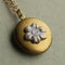 brass forget me not flower locket necklace