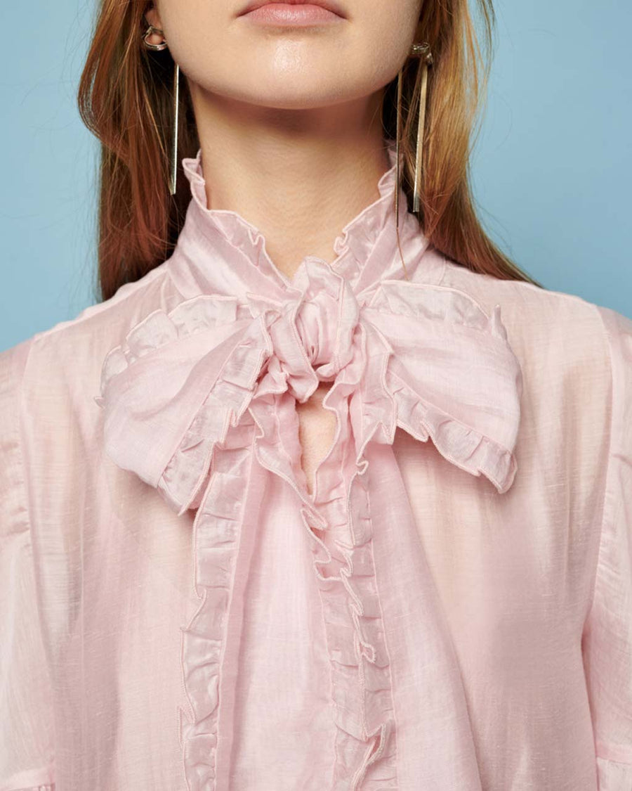 up close of pink satin tie bow neckline