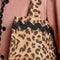 up close of model wearing woven leopard print tote bag with black ricrac detail on the top