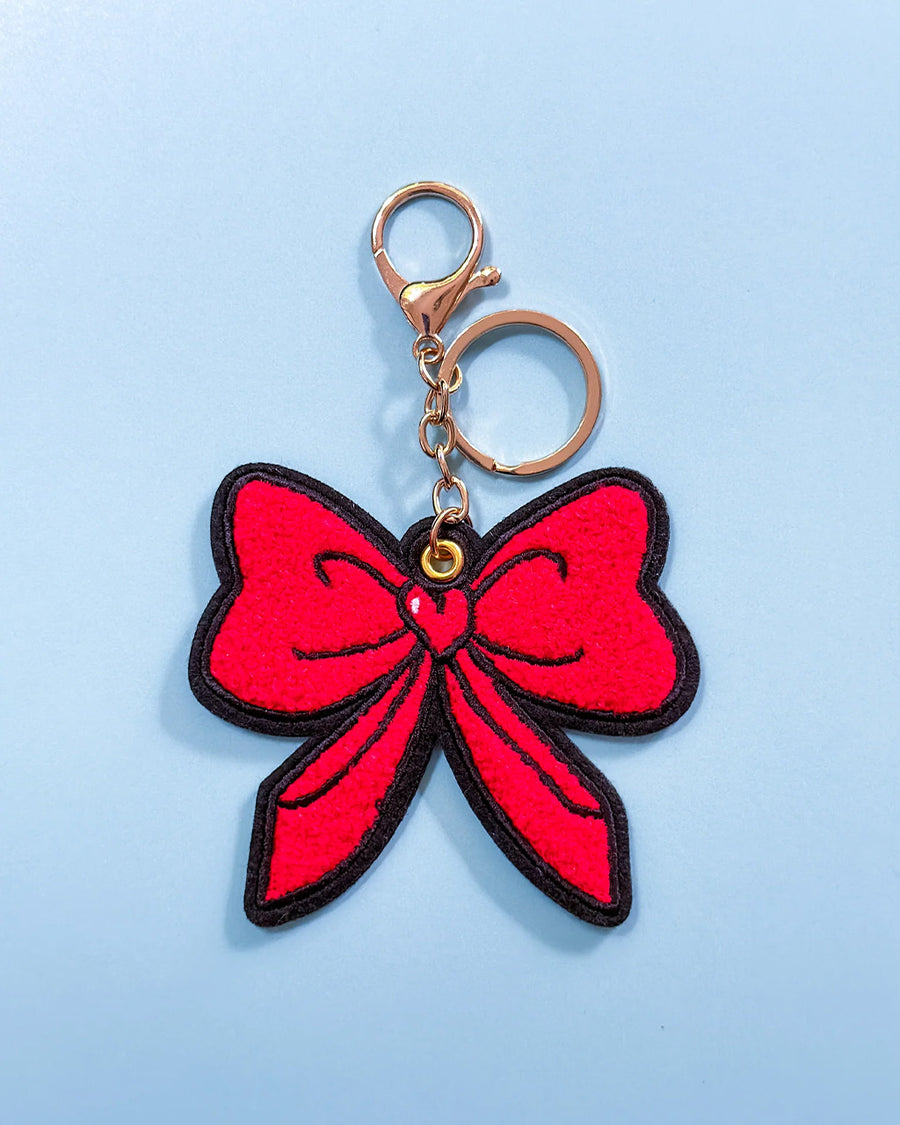 keychain with oversized red chenille bow