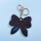 black back keychain with oversized red chenille bow