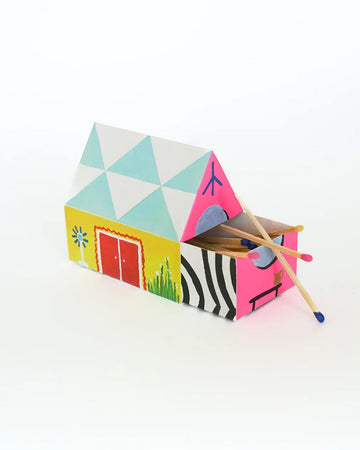 colorful tipped matches in a colorful house shaped box