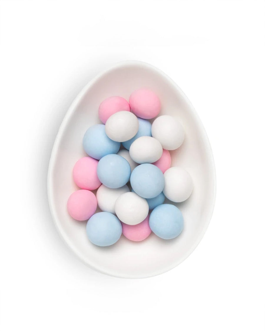 white, blue and pink hard shell chocolate candies