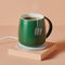 dark green smart heated mug set with heat plate with hot tea inside