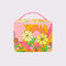 pink pouch with handle and double zippers with colorful 70's type floral print