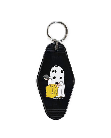 black key tags with peanuts character dressed as a ghost holding a rock