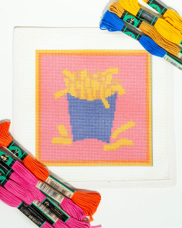 french fries in blue container needlepoint kit with embroidery yarn and instructions