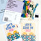 top view of 'let's stay in bed' typography and people graphic needlepoint kit with embroidery yarn and instructions