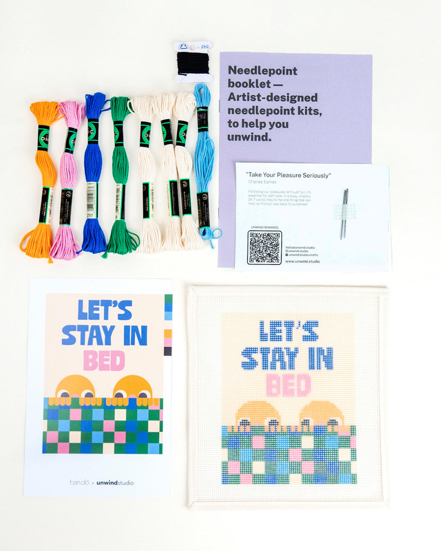 'let's stay in bed' typography and people graphic needlepoint kit with embroidery yarn and instructions