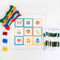 needlepoint kit with colorful embroidery thread and template