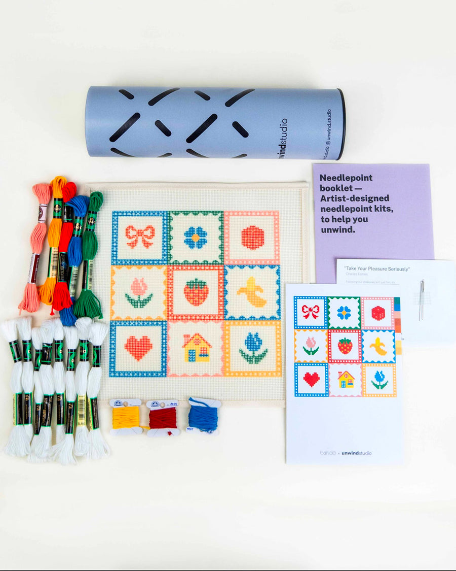 needlepoint kit with colorful embroidery thread and template