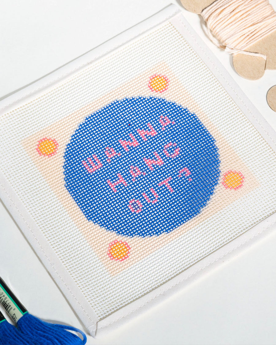 'wanna hang out' blue circle needlepoint kit with embroidery yarn and instructions