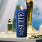 blue vacation sunscreen suite pillar candle on table