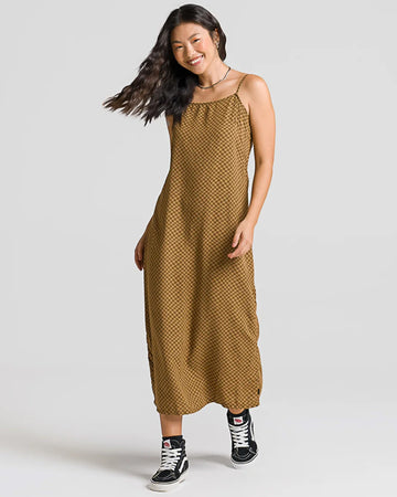 model wearing dark brown and tan smaller checkered tank midi dress