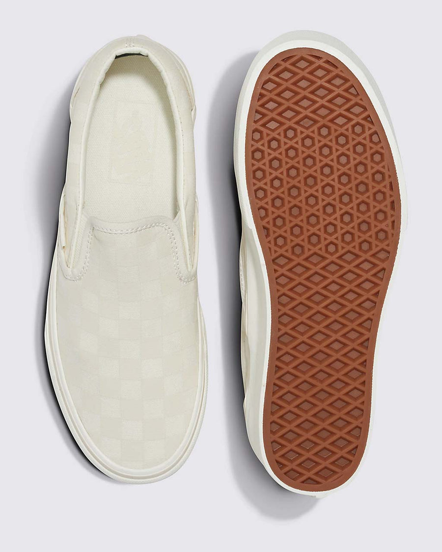 top and bottom view oof cream and white checkerboard vans slip-on stackforms