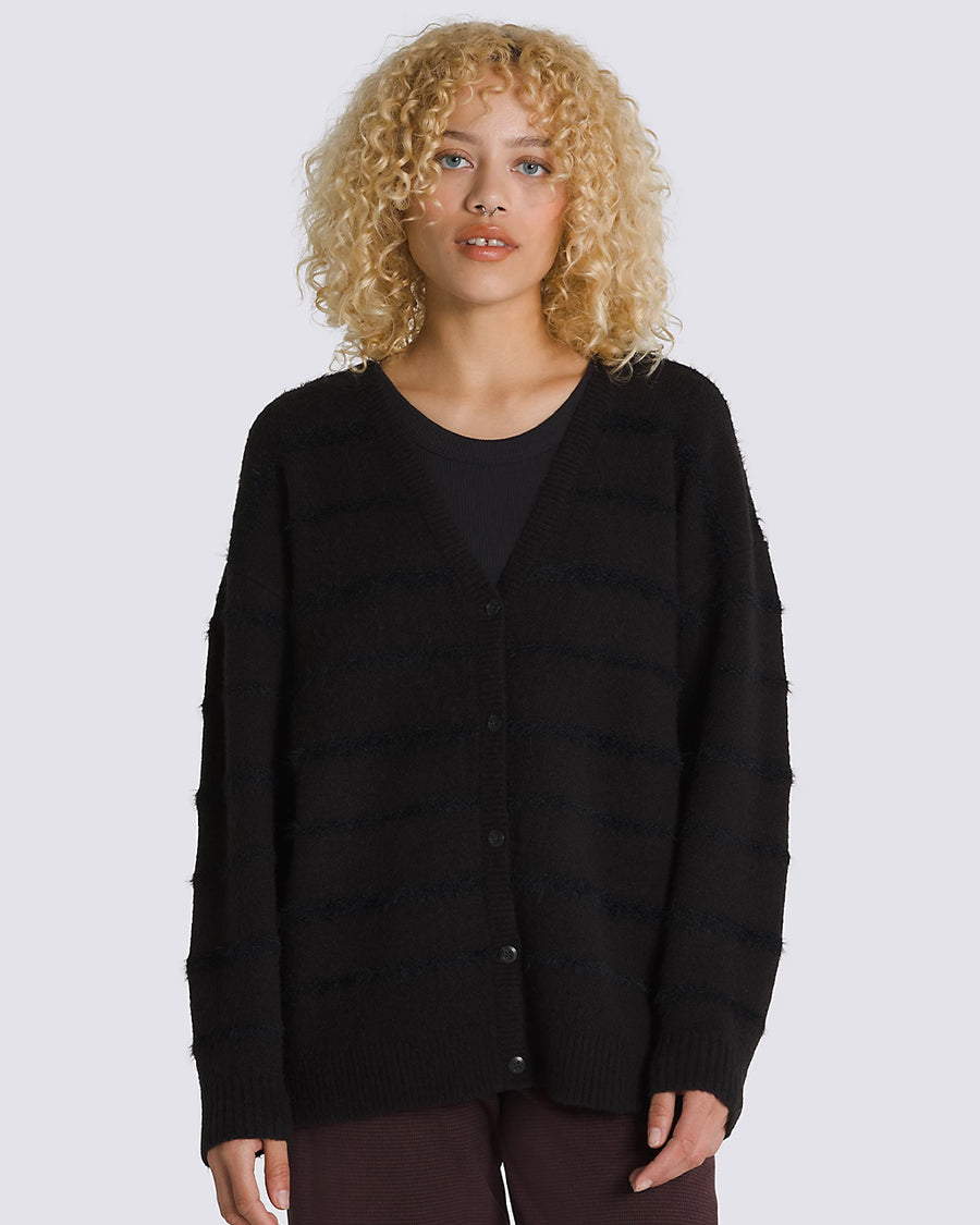 model wearing black relaxed cardigan with eyelash texture