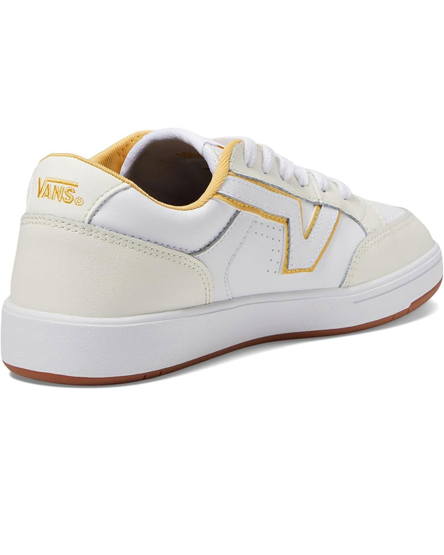 back view of white comfycush sneaker with yellow trim