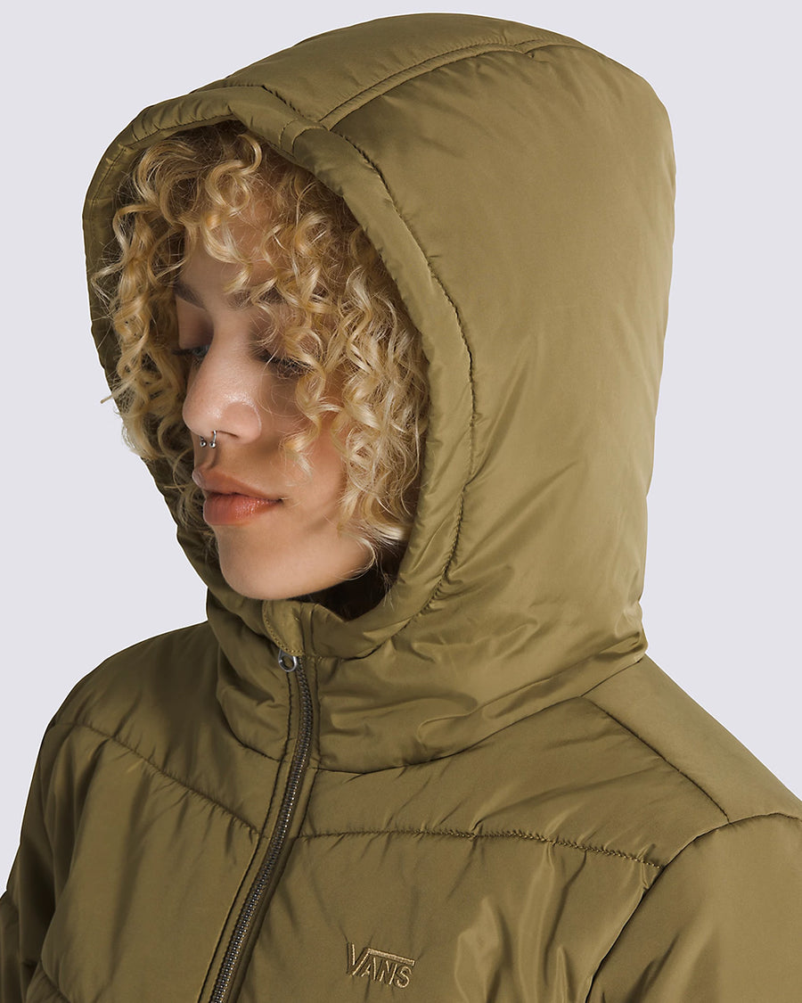 model wearing olive cropped puffer jacket with hood on