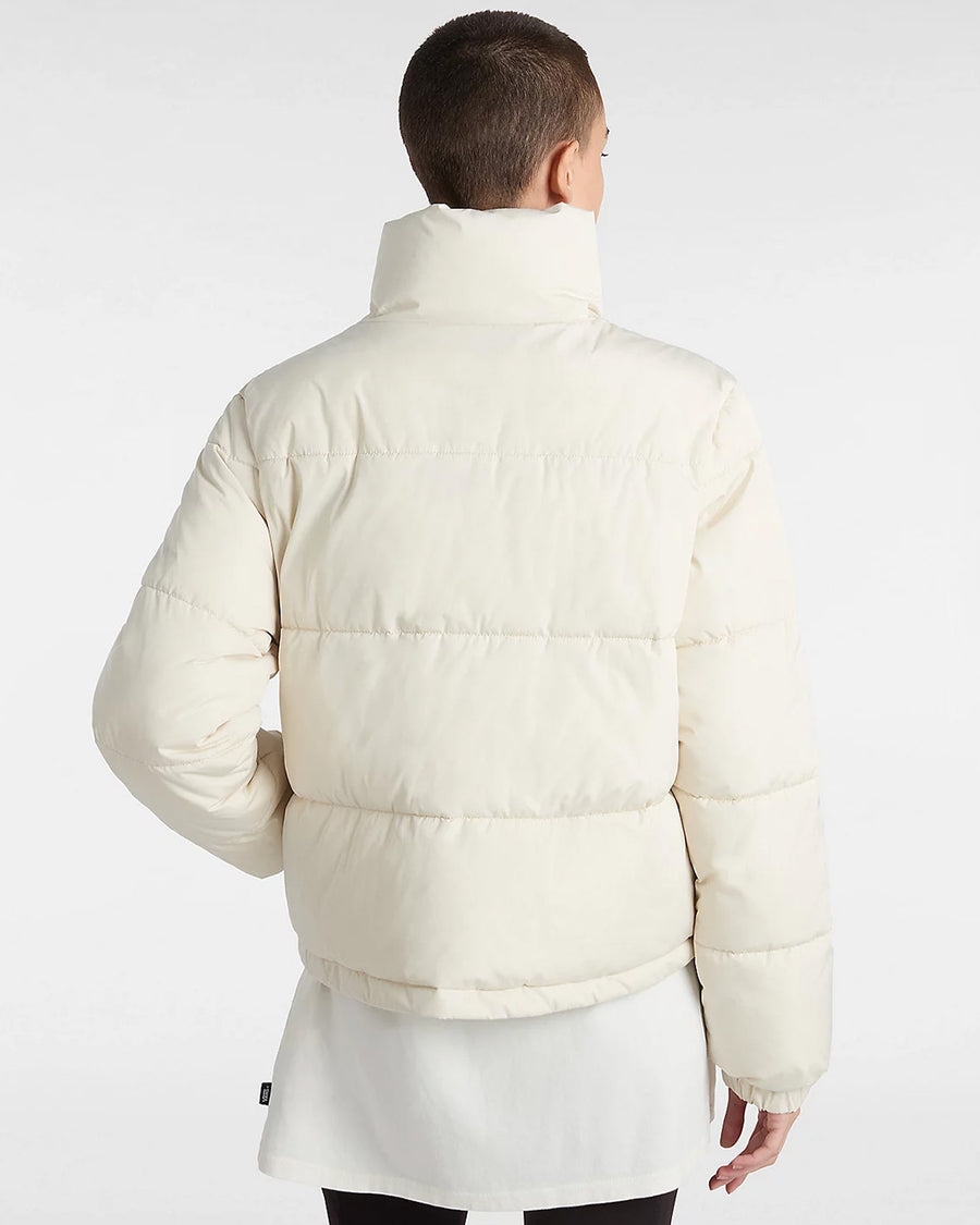 back view of model wearing cream cropped  puffer jacket